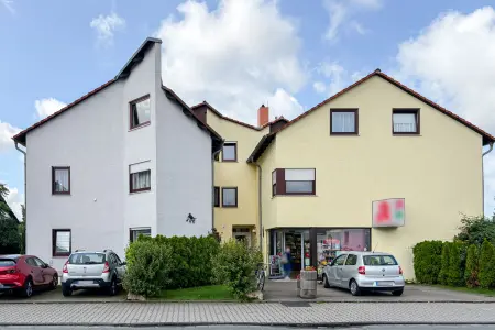 Frontansicht der Immobilie: Perfekt für Singles oder Paare: Eine gemütliche Dachgeschosswohnung in Weiterstadt/Gräfenhausen (Titelbild)