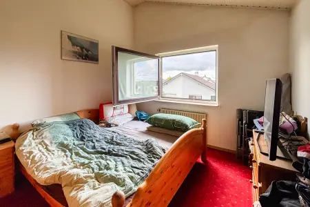 Schlafzimmer der Immobilie: Perfekt für Singles oder Paare: Eine gemütliche Dachgeschosswohnung in Weiterstadt/Gräfenhausen (Foto)