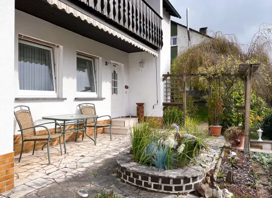EG_Terrasse der Immobilie: Ein Zuhause mit Herz – großzügiges Einfamilienhaus mit Einliegerwohnung und Platz für Ideen (Foto)